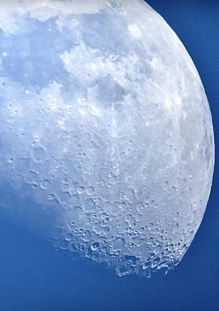 moon photo taken with 10 “ F/6 Newtonian Dob Tele Vue 27mm Panoptic eyepiece 
