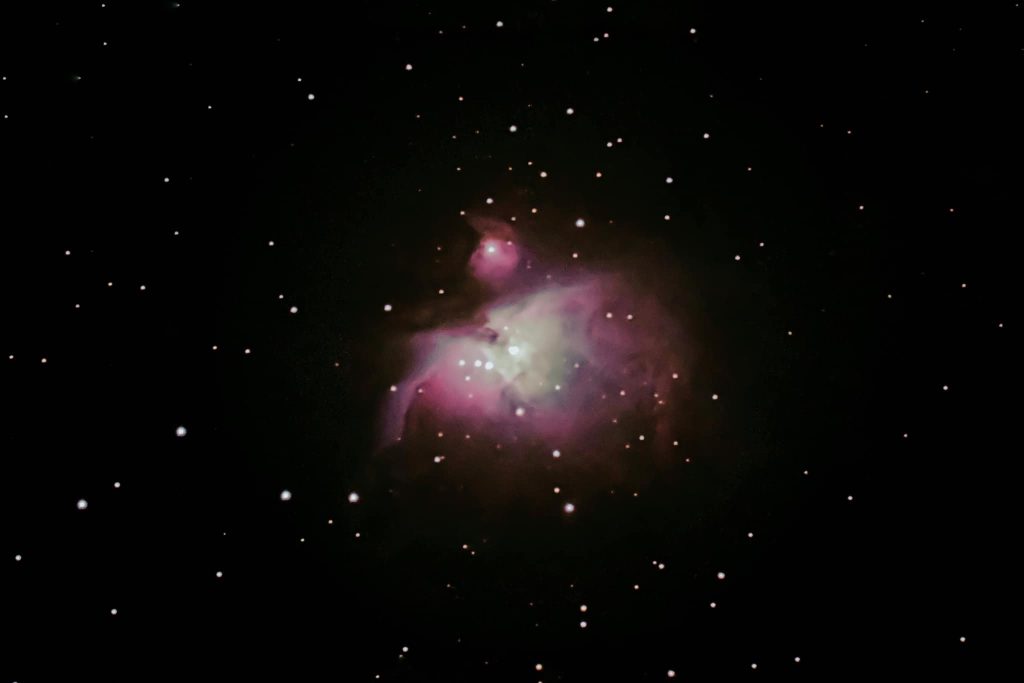 Orion Nebula photo. ISO 1600, Exposure: 20 seconds. Taken with Celestron Astro-Fi 5 (125x1250 mm) F6.3 Focal Reducer. Camera Canon 250D